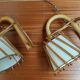 Pair of rattan wall lamps