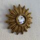 Vintage 1960s sunburst witch's eye mirror in gold - 27 cm