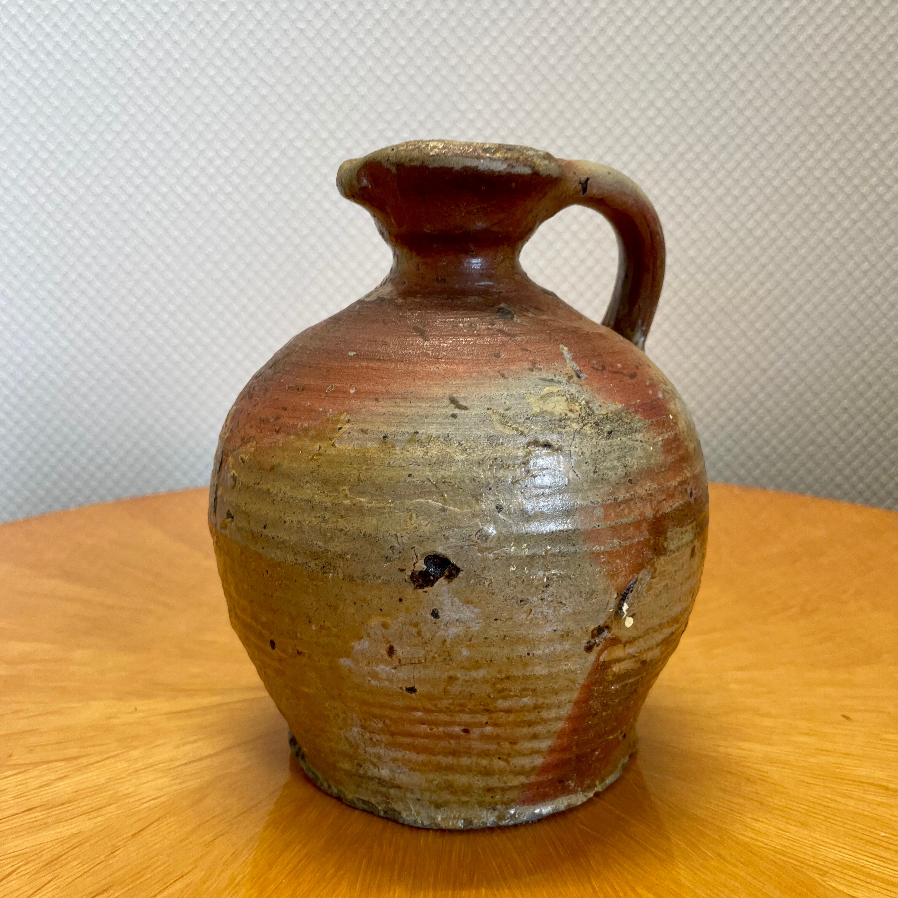 Old sandstone pitcher