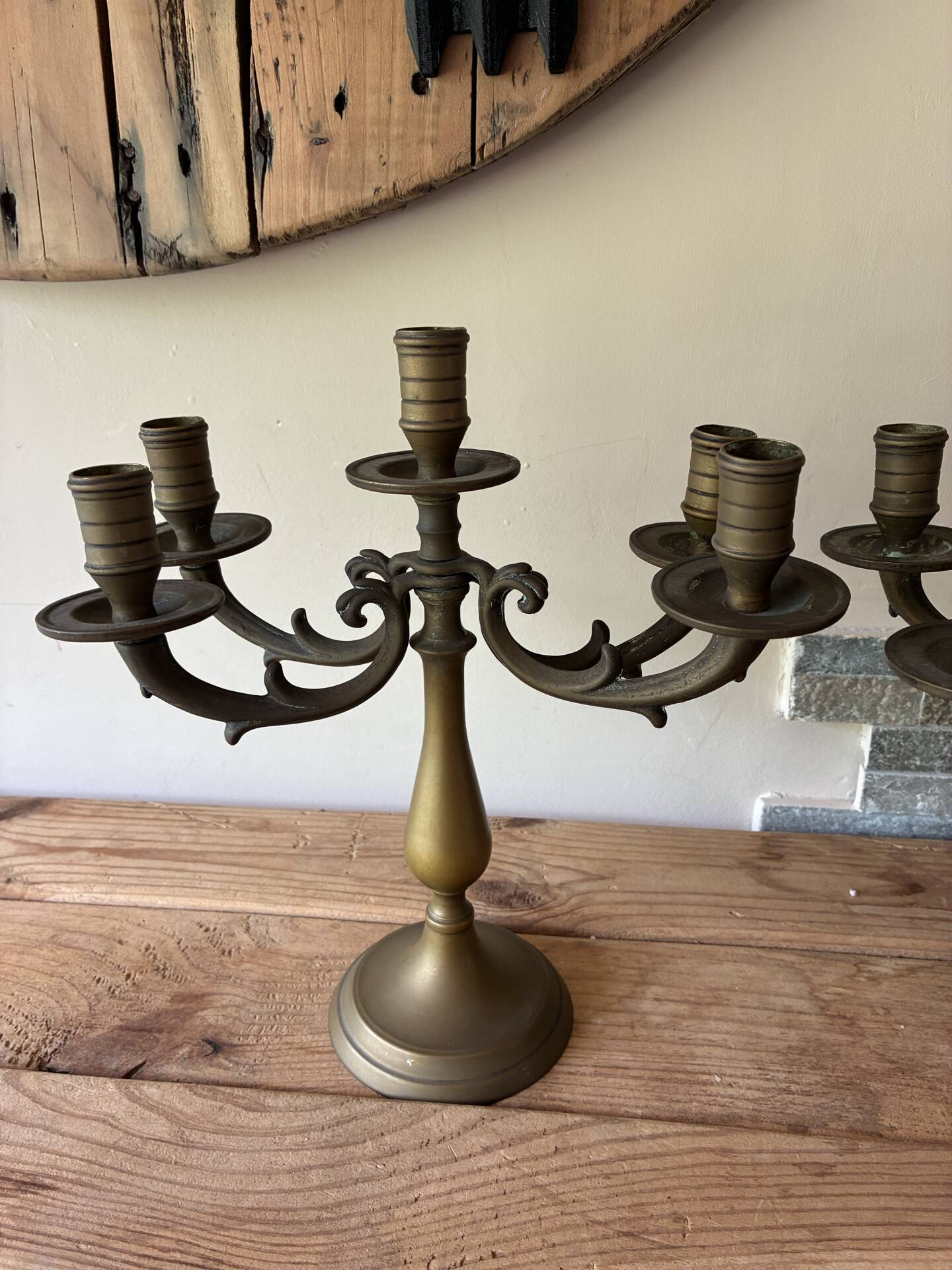 Pair of large 5-light candlesticks in patinated brass, classical style.