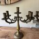 Pair of large 5-light candlesticks in patinated brass, classical style.