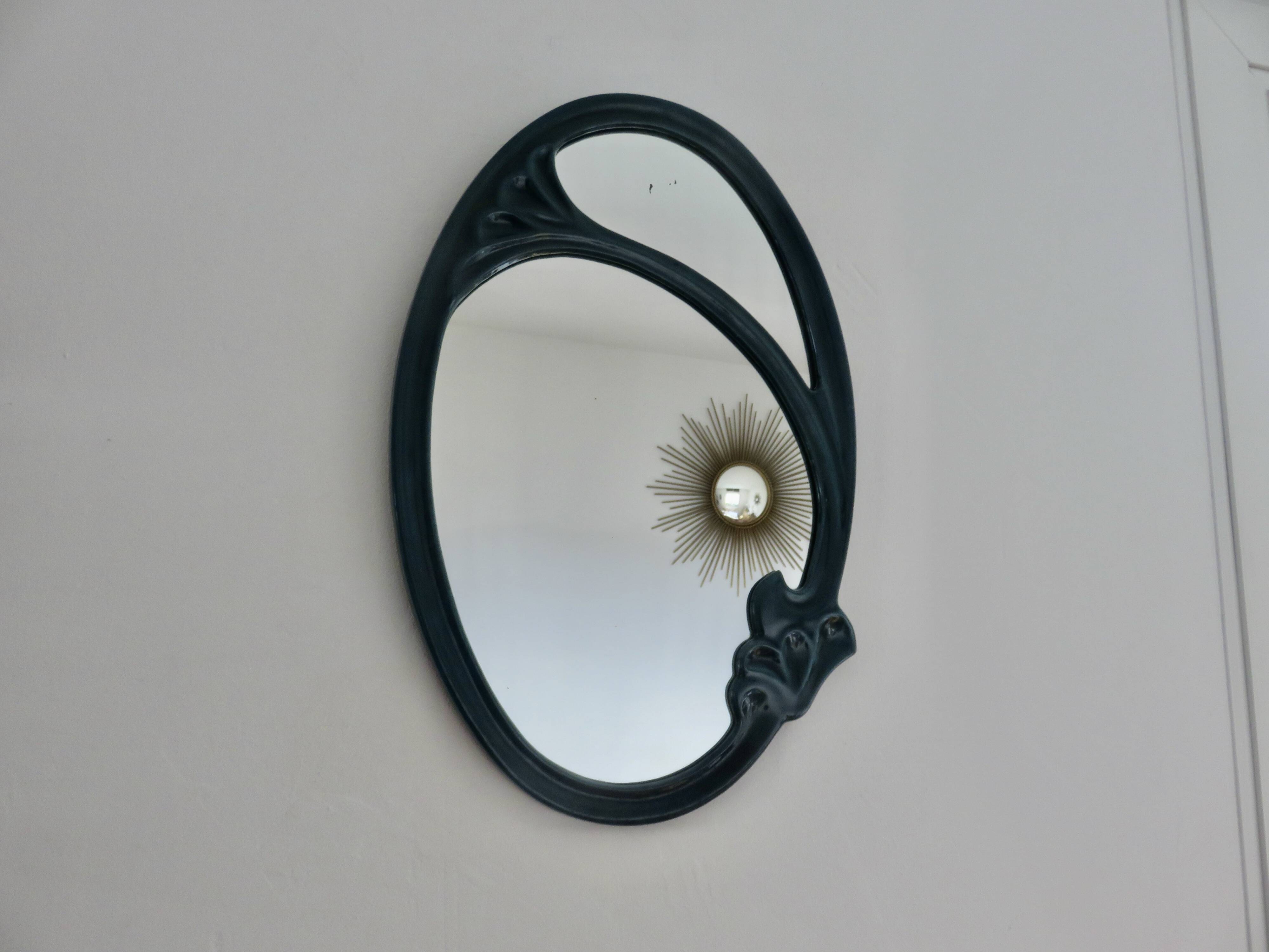 Art Nouveau mirror in blue enamelled cast iron in the style of Hector Guimard.