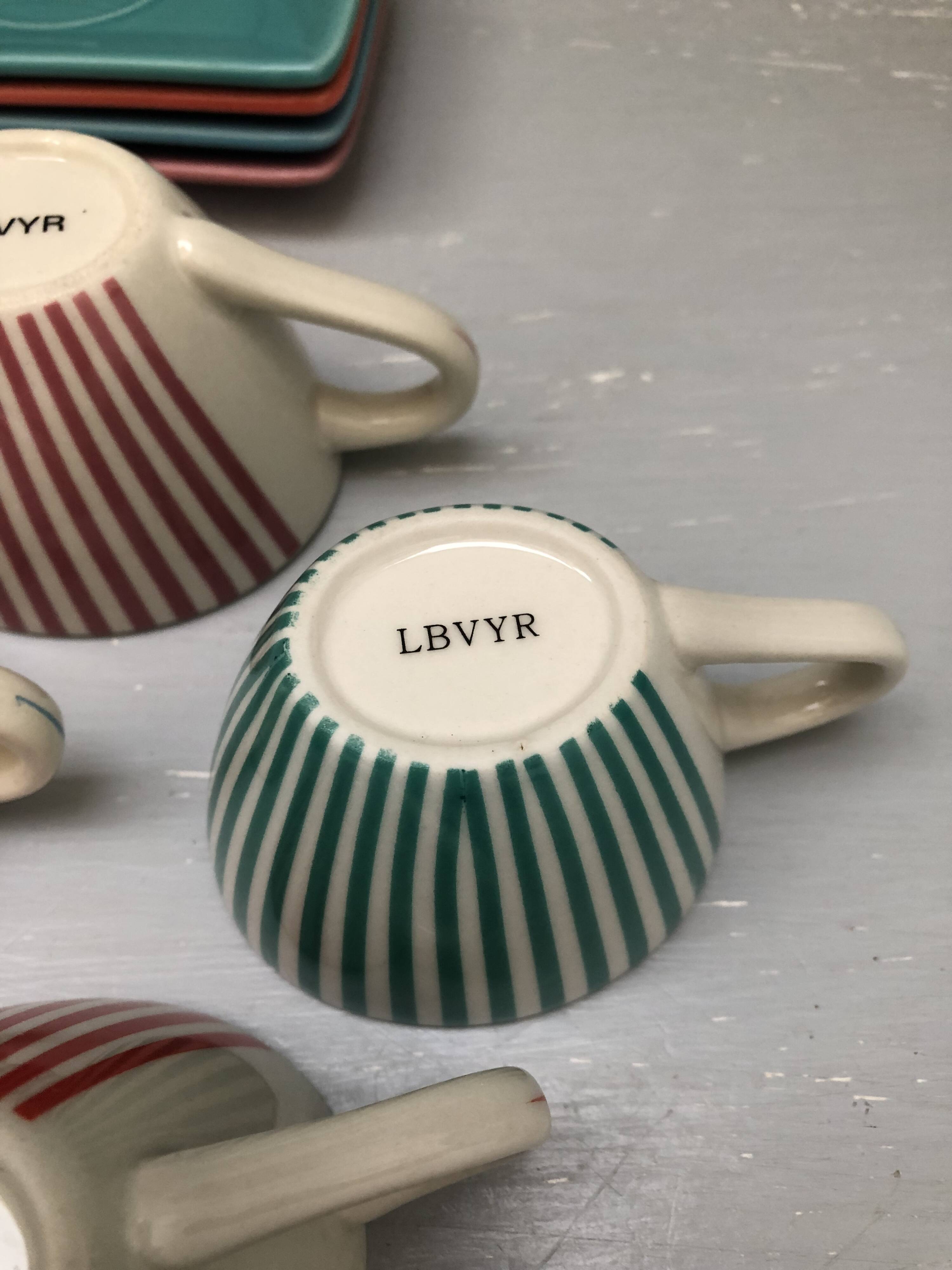 4 vintage ceramic coffee cups produced by LBVYR Circa