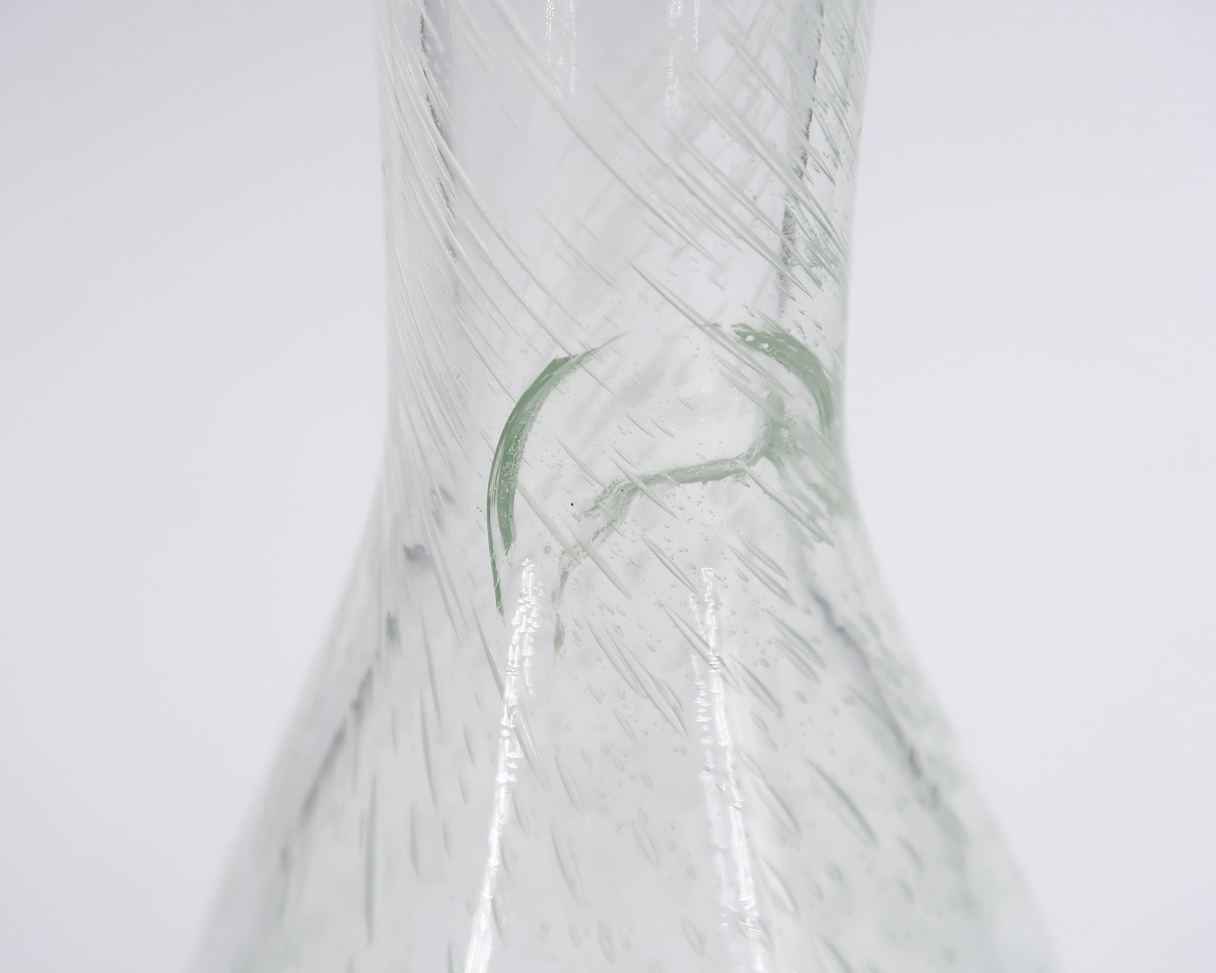 Clear bubbled glass carafe bottle from Biot, 1970s