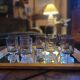 12 smoked glass stemmed glasses from the 70s and 80s.