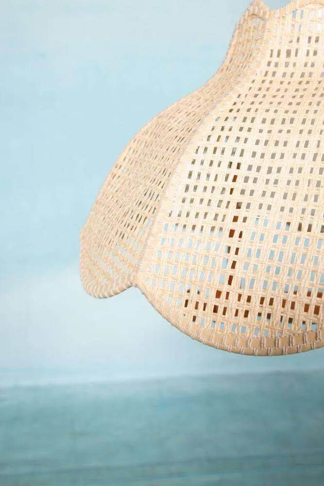 Swedish suspended lamp in bohemian strap.