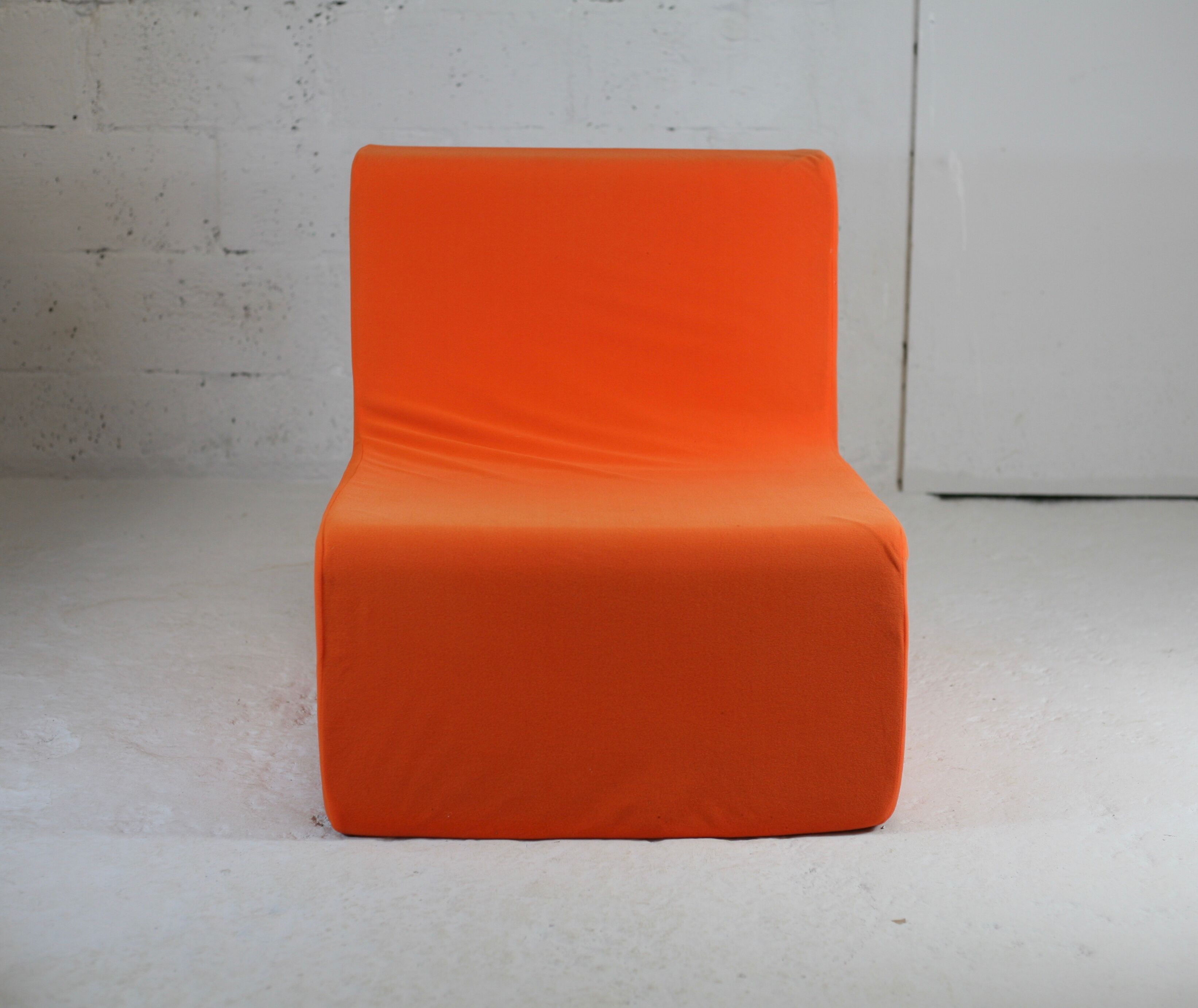 Armchair "space age" foam and orange jersey. Circa 1970