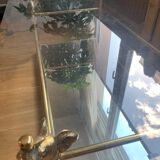 Table Hollywood Regency en laiton et verre avec têtes d'éléphants