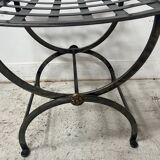 Set of four wrought iron chairs, with a reclining X-shaped base, seat and backrest.