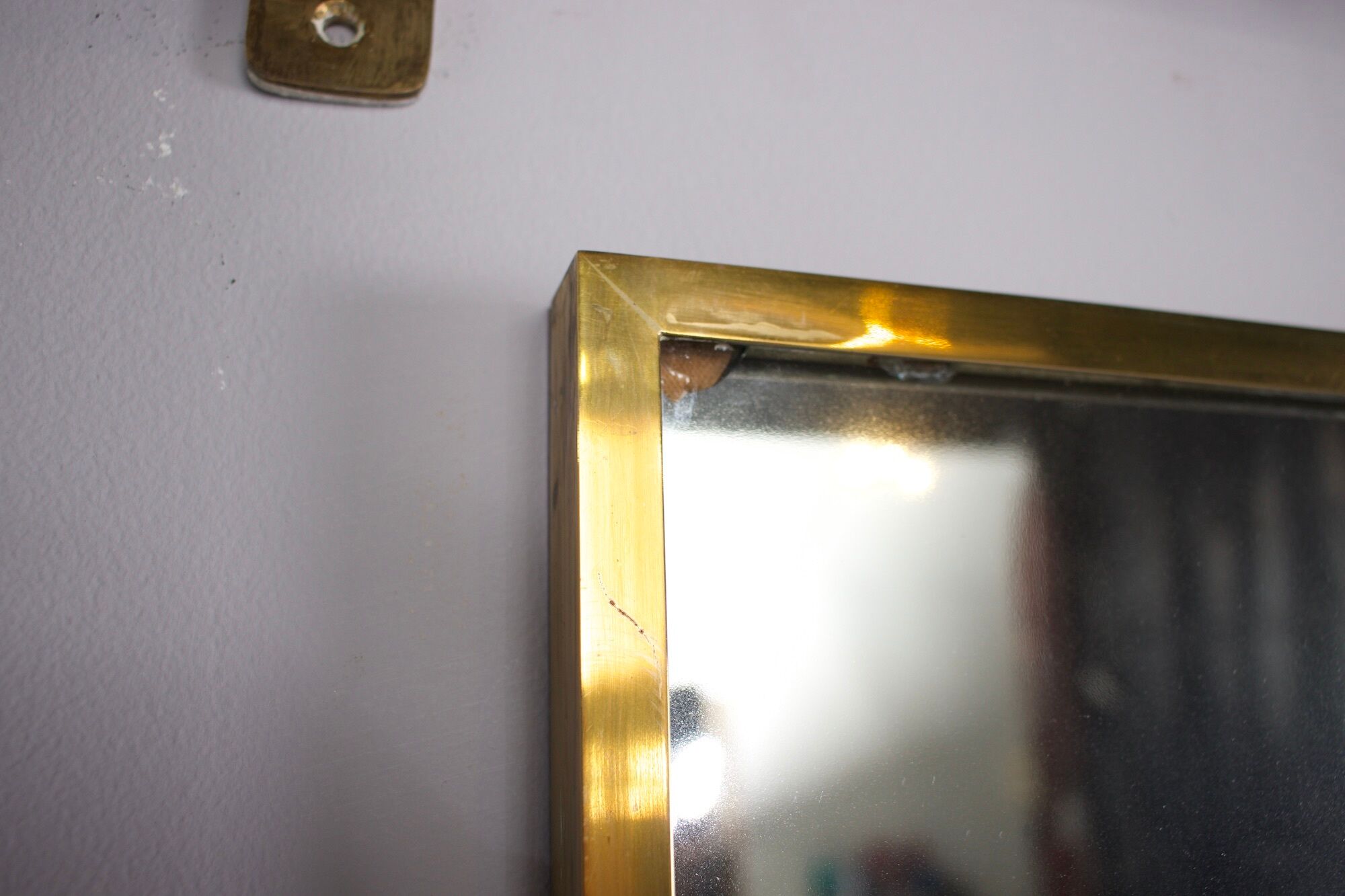 Vereinigte Werkstätten, brass cloakroom and mirror