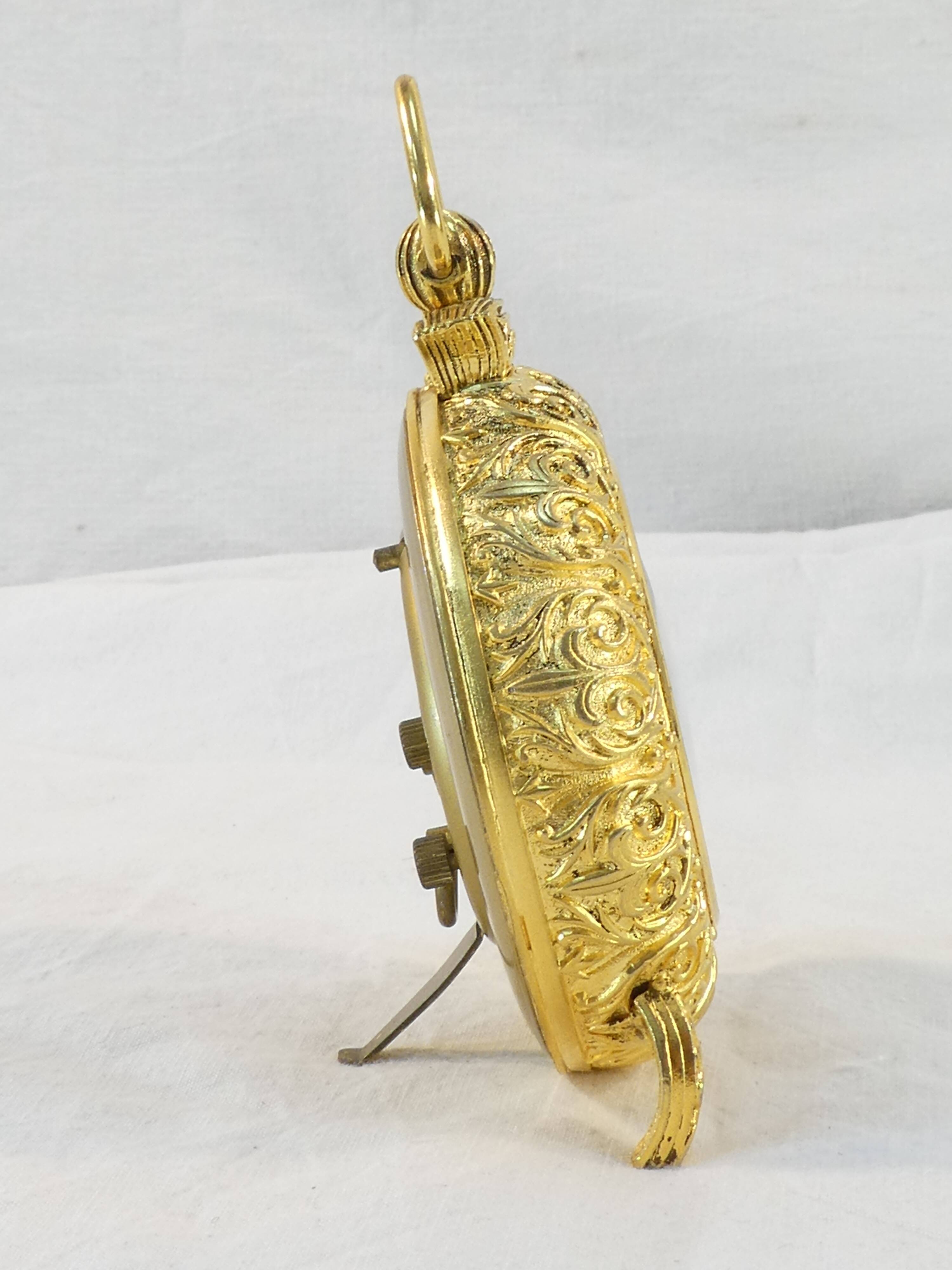 LANCEL alarm clock in chiseled bronze and gilded metal