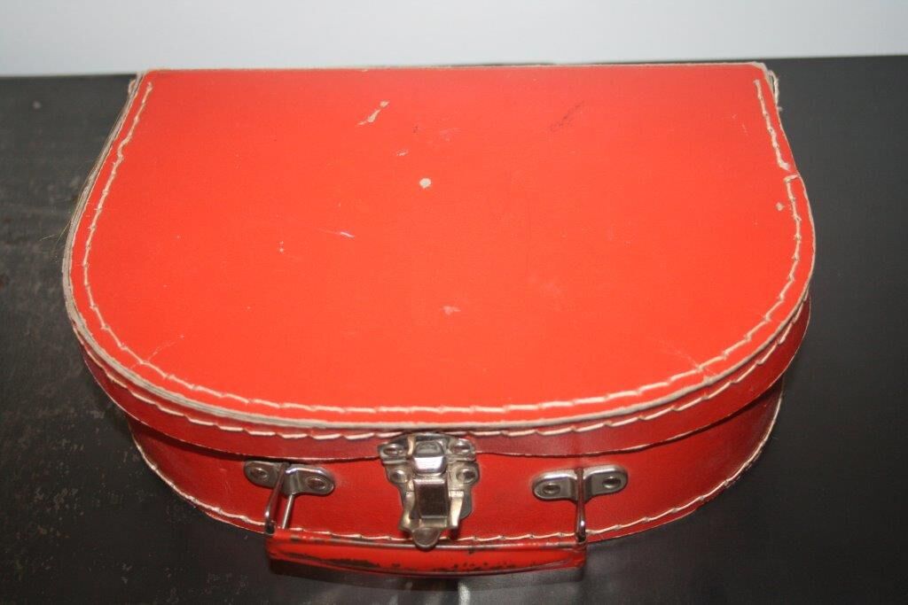 Small suitcase cardboard orange
