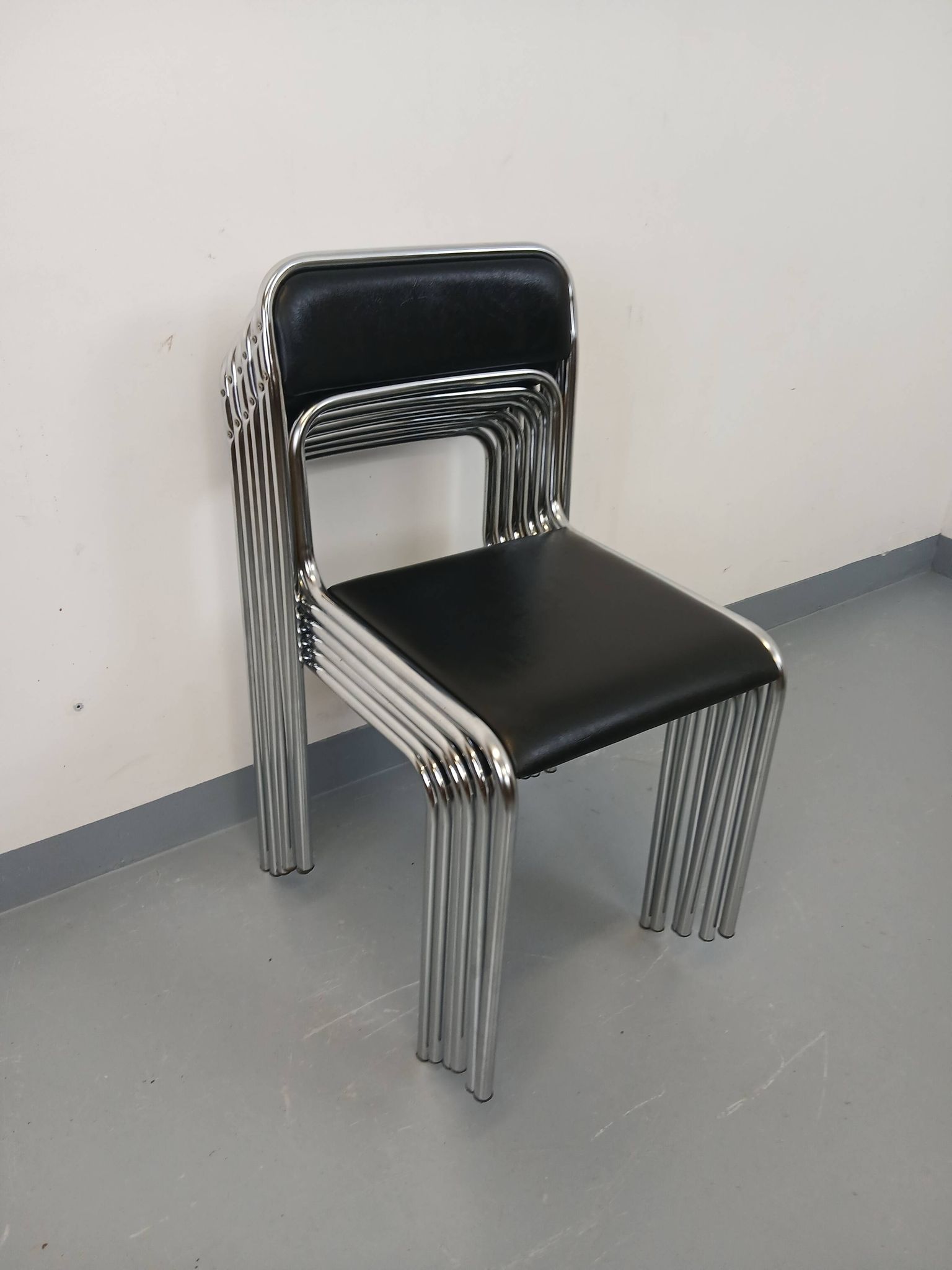 Set of 6 vintage Italian stackable chairs in chrome metal and skai.