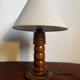 Table lamp with carved wooden base