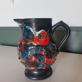Glazed ceramic pitcher