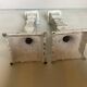 Pair of patinated cast iron candlesticks