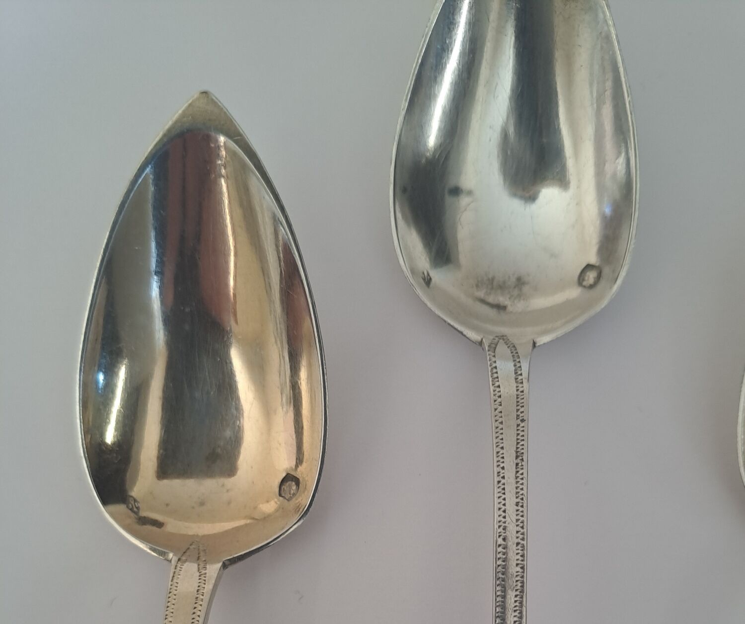 6 small numbered silver teaspoons, Minerva hallmark.
