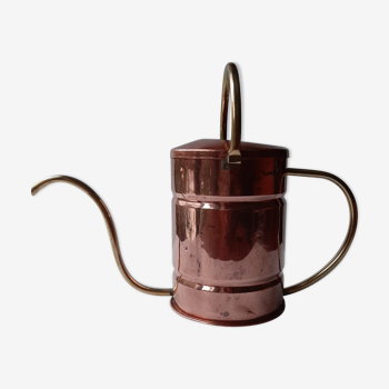 Ancient copper watering can