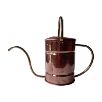 Ancient copper watering can