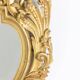 Regency style mirror in carved and gilded wood. 1950s.