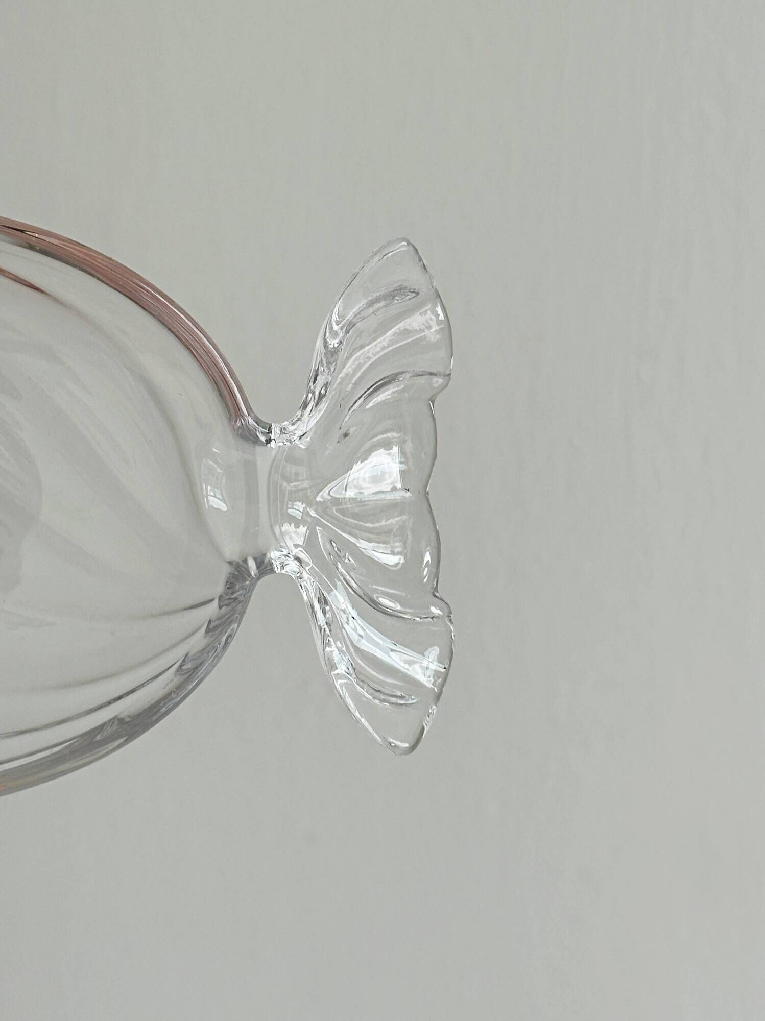 Vintage thick glass candy-shaped catchall.