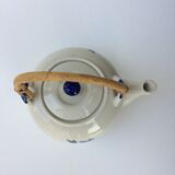 Vintage teapot with rattan handle