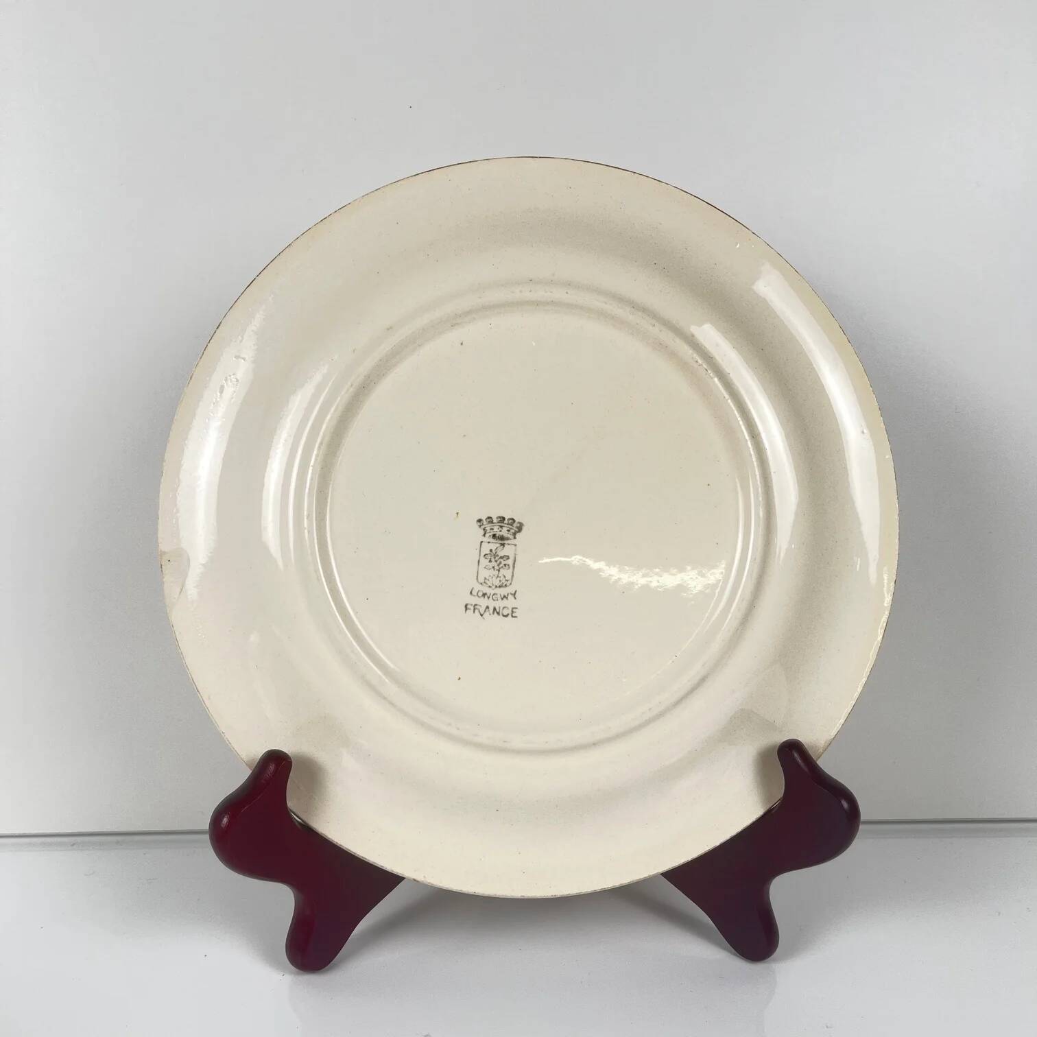 Set of 5 dessert plates Longwy, early 20th century, floral decoration.