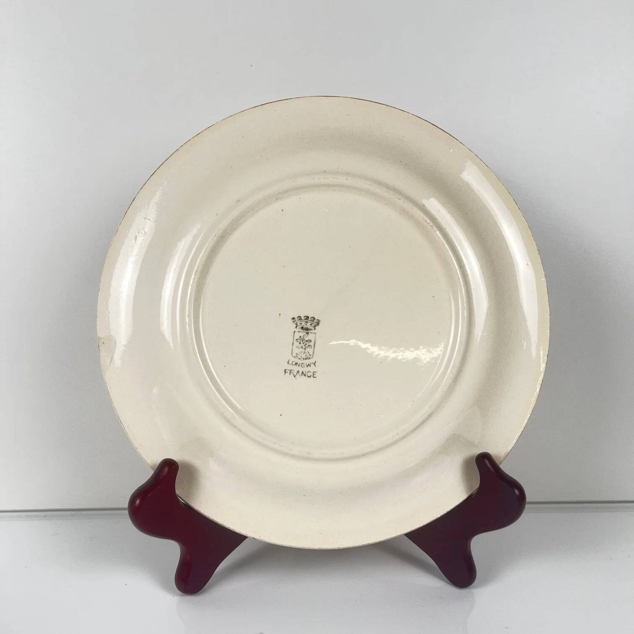 Set of 5 dessert plates Longwy, early 20th century, floral decoration.