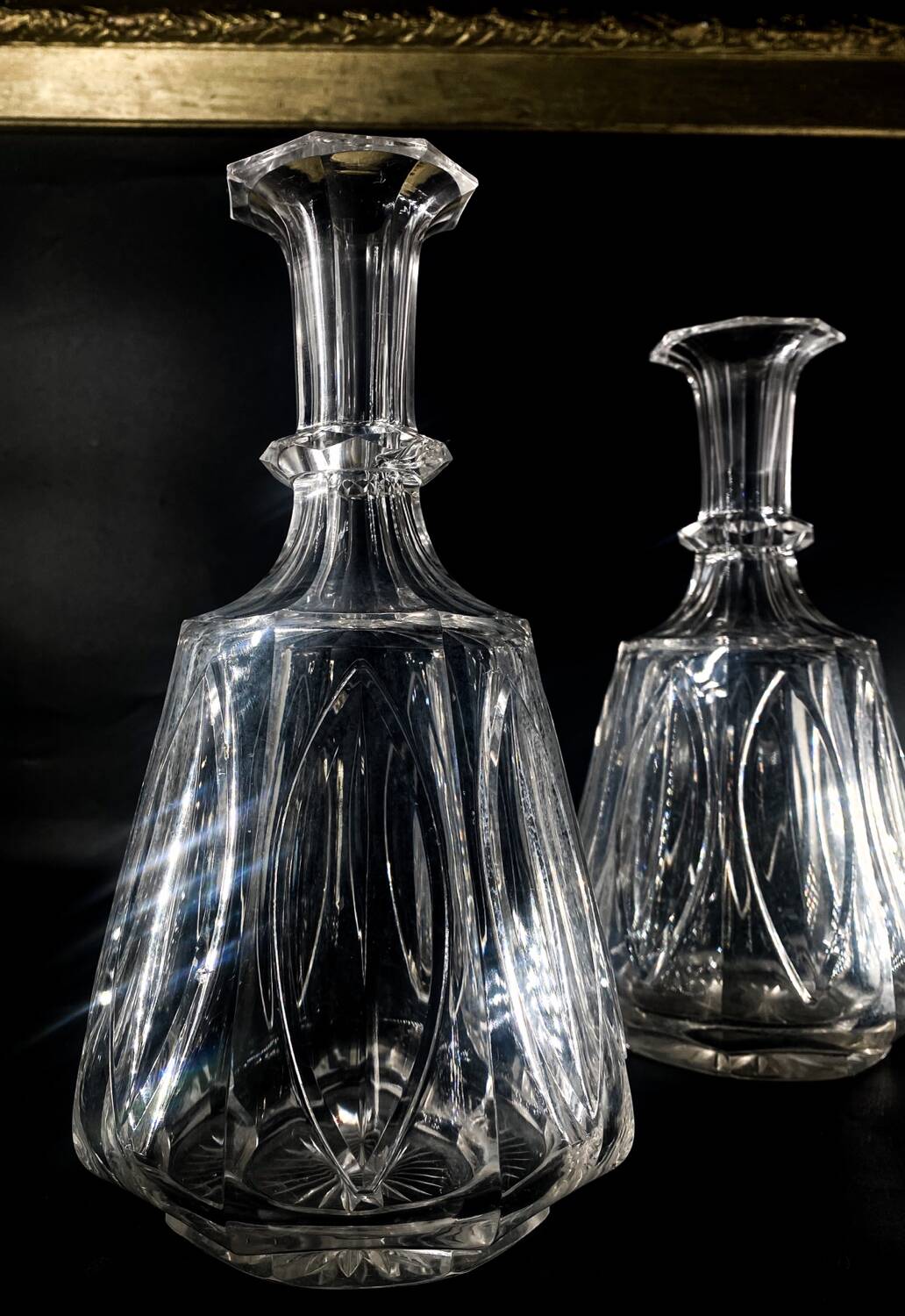 Two Le Creusot wine carafes (Baccarat) 19th century. Leaves