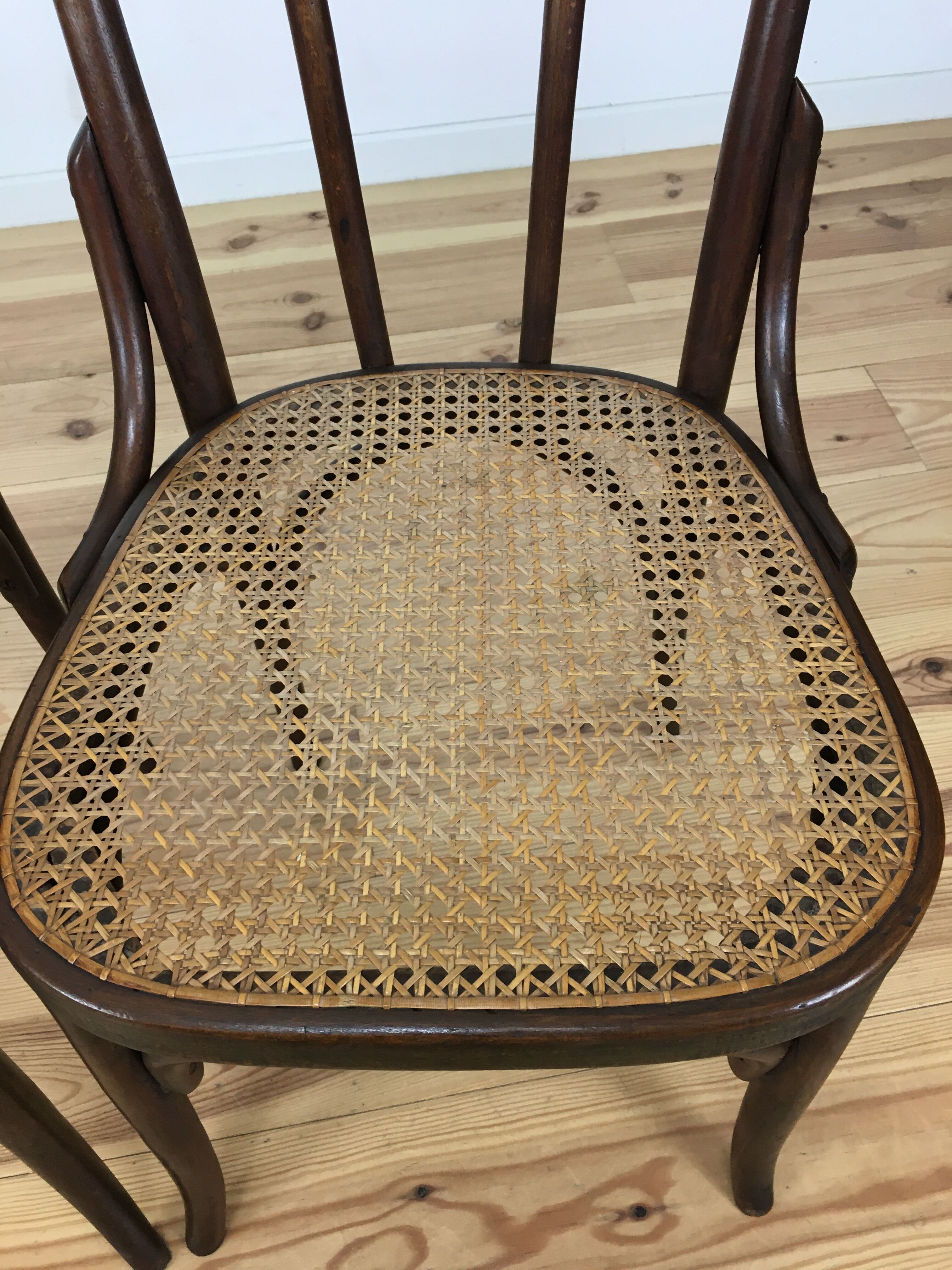 2 chairs in curved wooden and canning