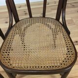 2 chairs in curved wooden and canning