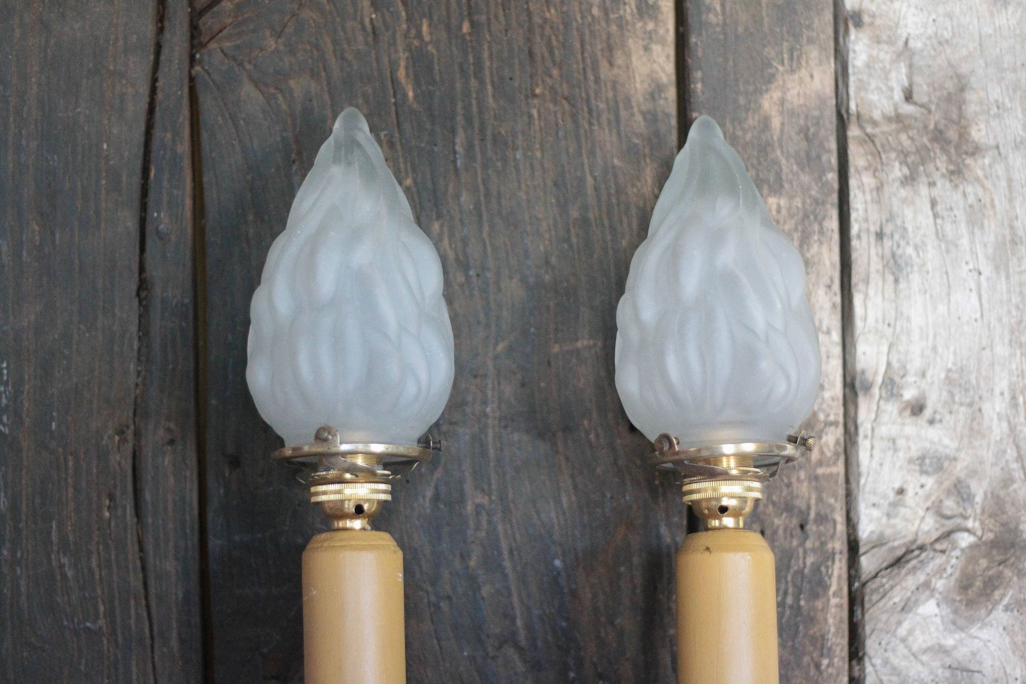 Large pair of silver-plated wall lights with flame globes, torches.
