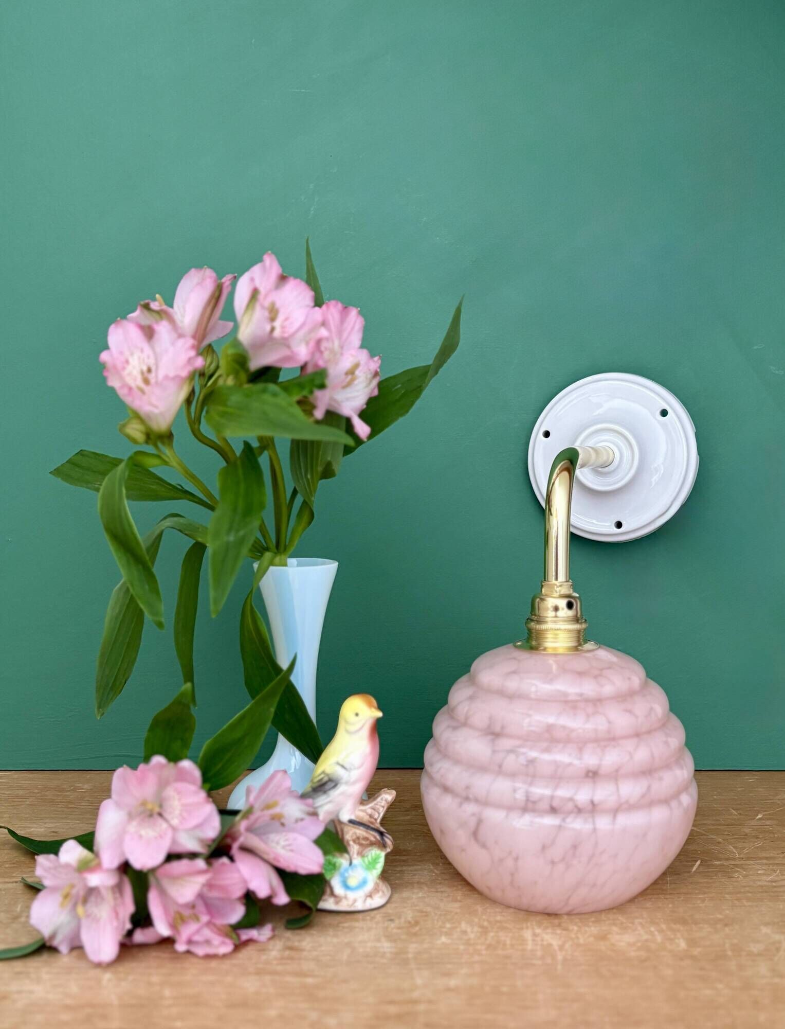 Vintage pink Clichy glass globe wall light.