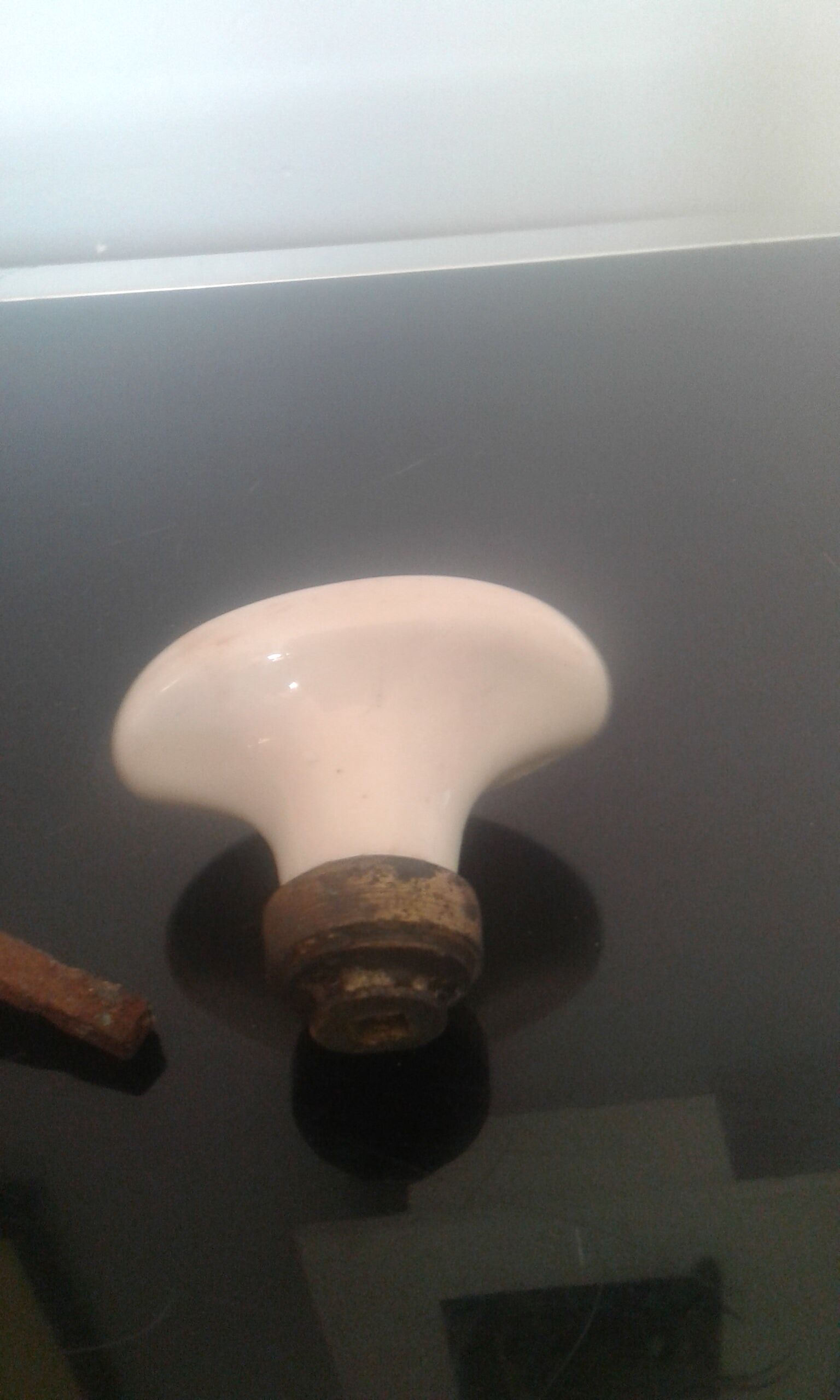Old pair of porcelain door handles