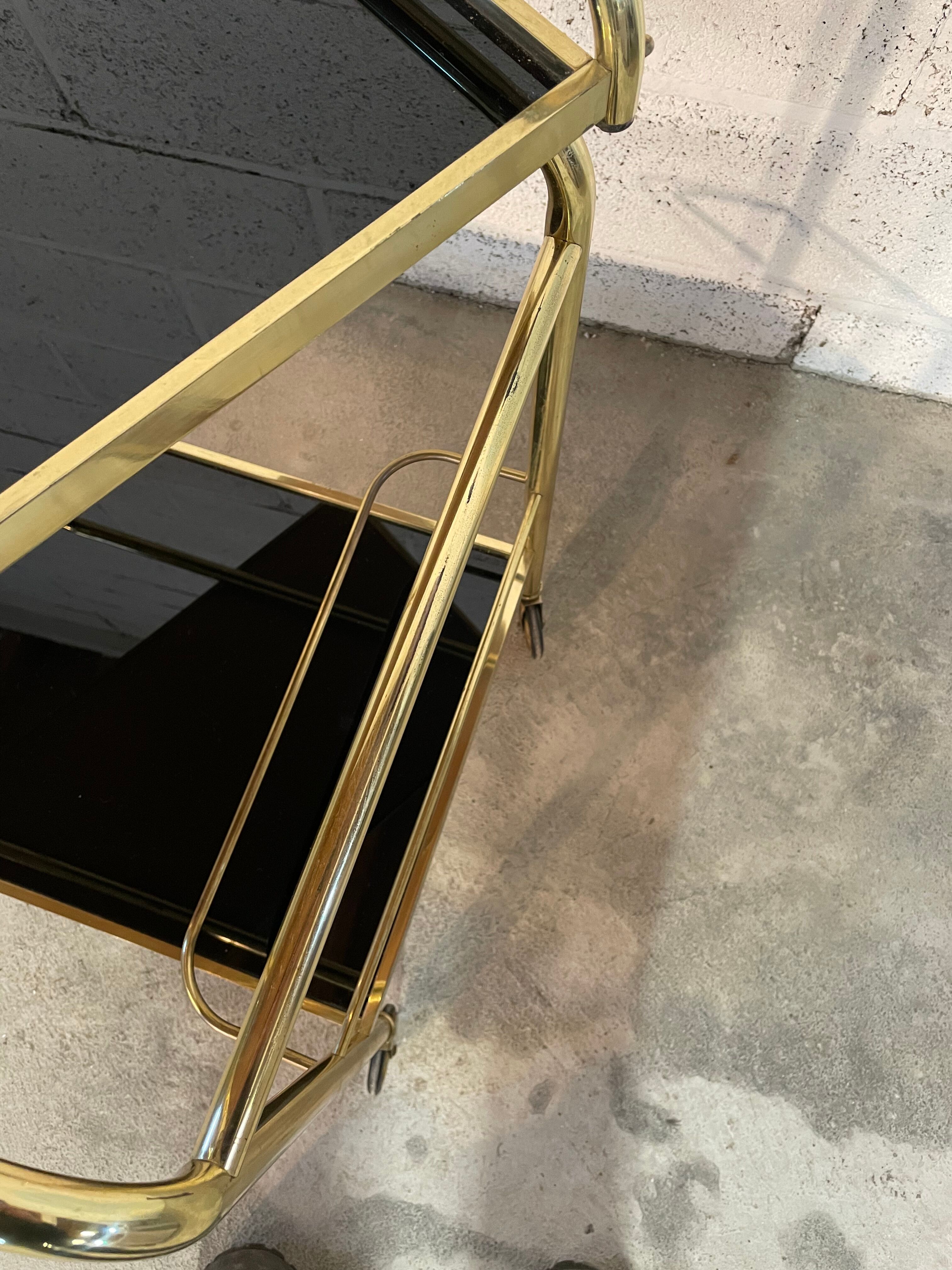Vintage golden and black rolling service 1970s