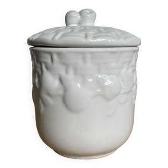 White cookie jar in slip and fruit patterns