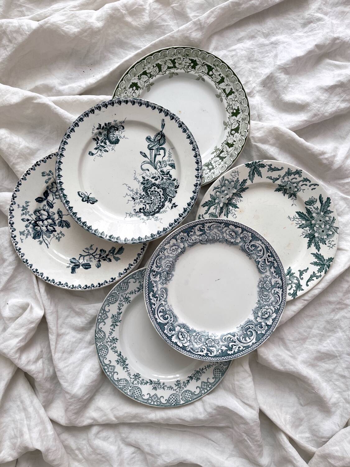 6 mismatched Saint Amand ironware dessert plates
