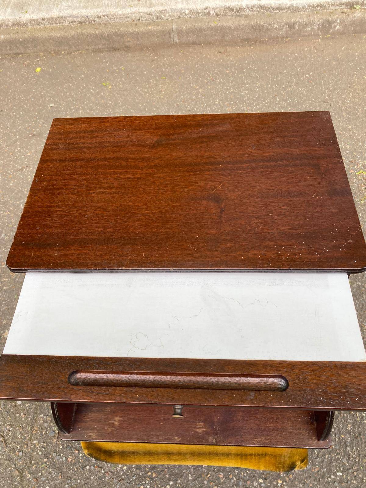 Mahogany bedside table in English style with stool.
