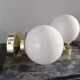 Paire d’appliques globes en opaline blanche