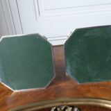 Pair of silver-plated metal candlesticks with cut sides