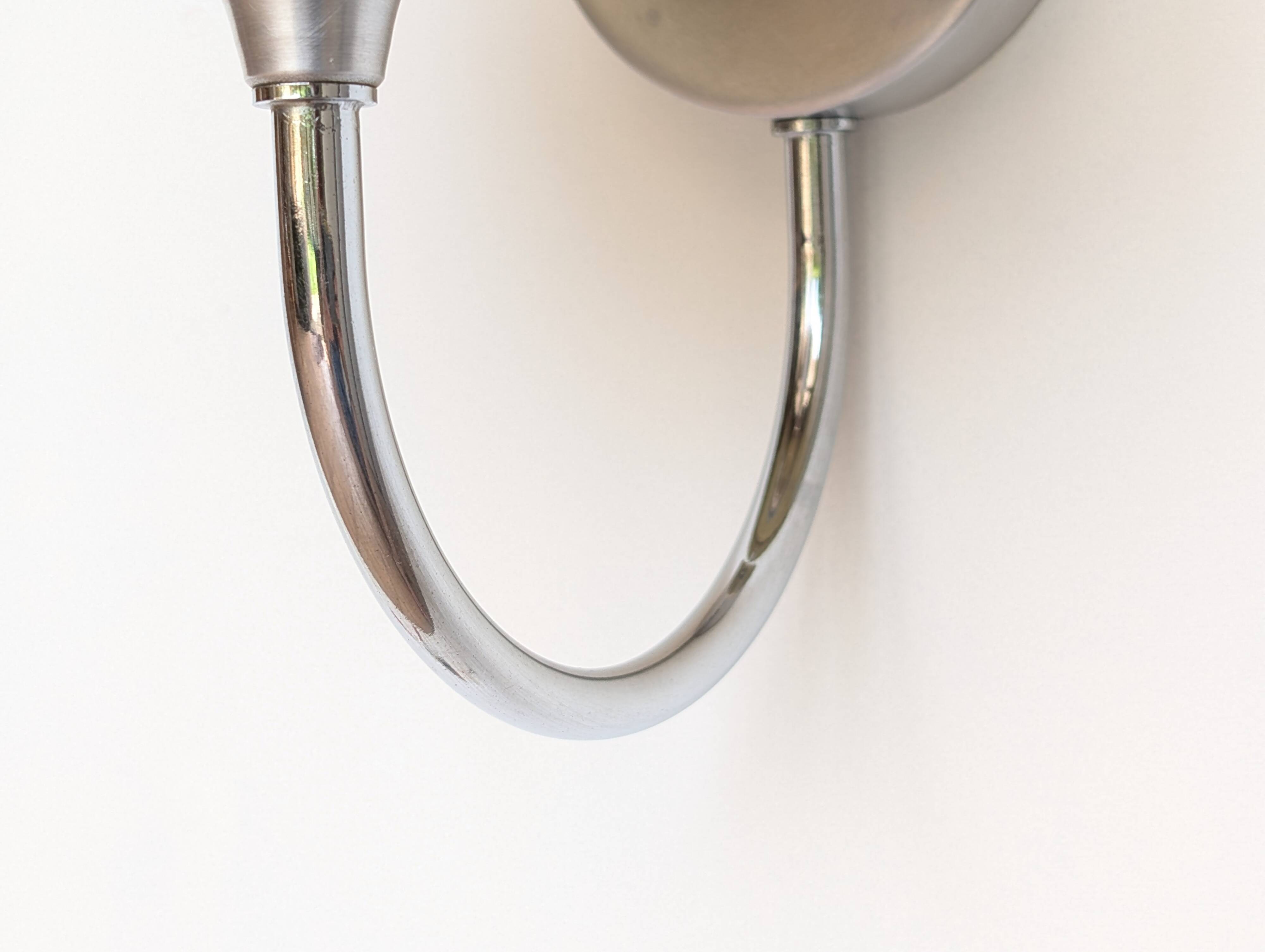 Pair of chrome and glass wall lights