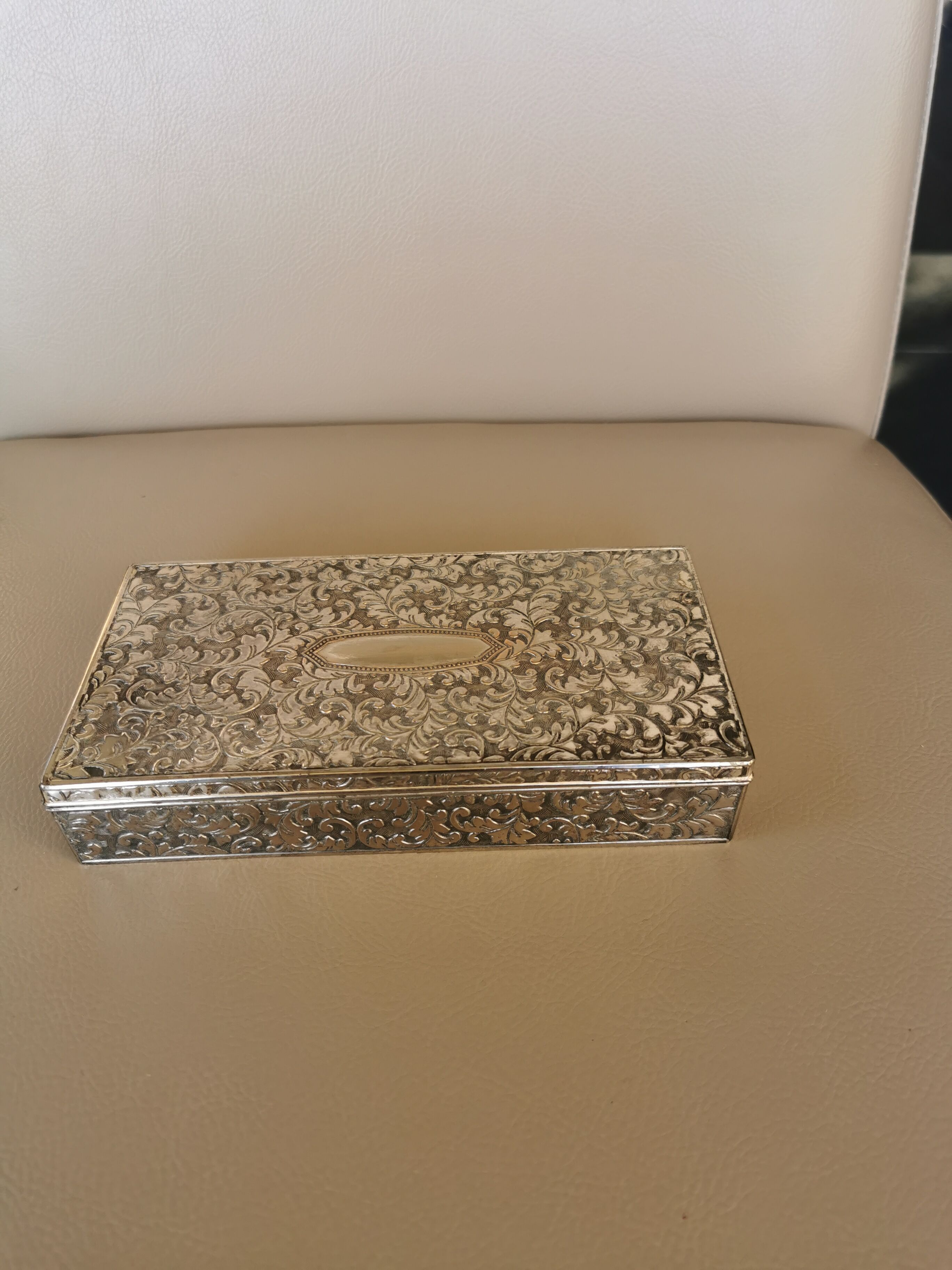 Old box in chiseled silver metal