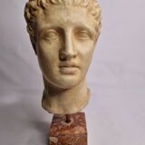 Bust of Hermes in patinated plaster on brown marble base, 34 cm