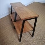 A pair of bedside tables