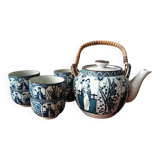 Asian ceramic and rattan tea set with plant geisha motifs