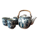 Asian ceramic and rattan tea set with plant geisha motifs