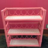 Pink rattan shelf