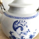 Teapot in porcelain of Paris