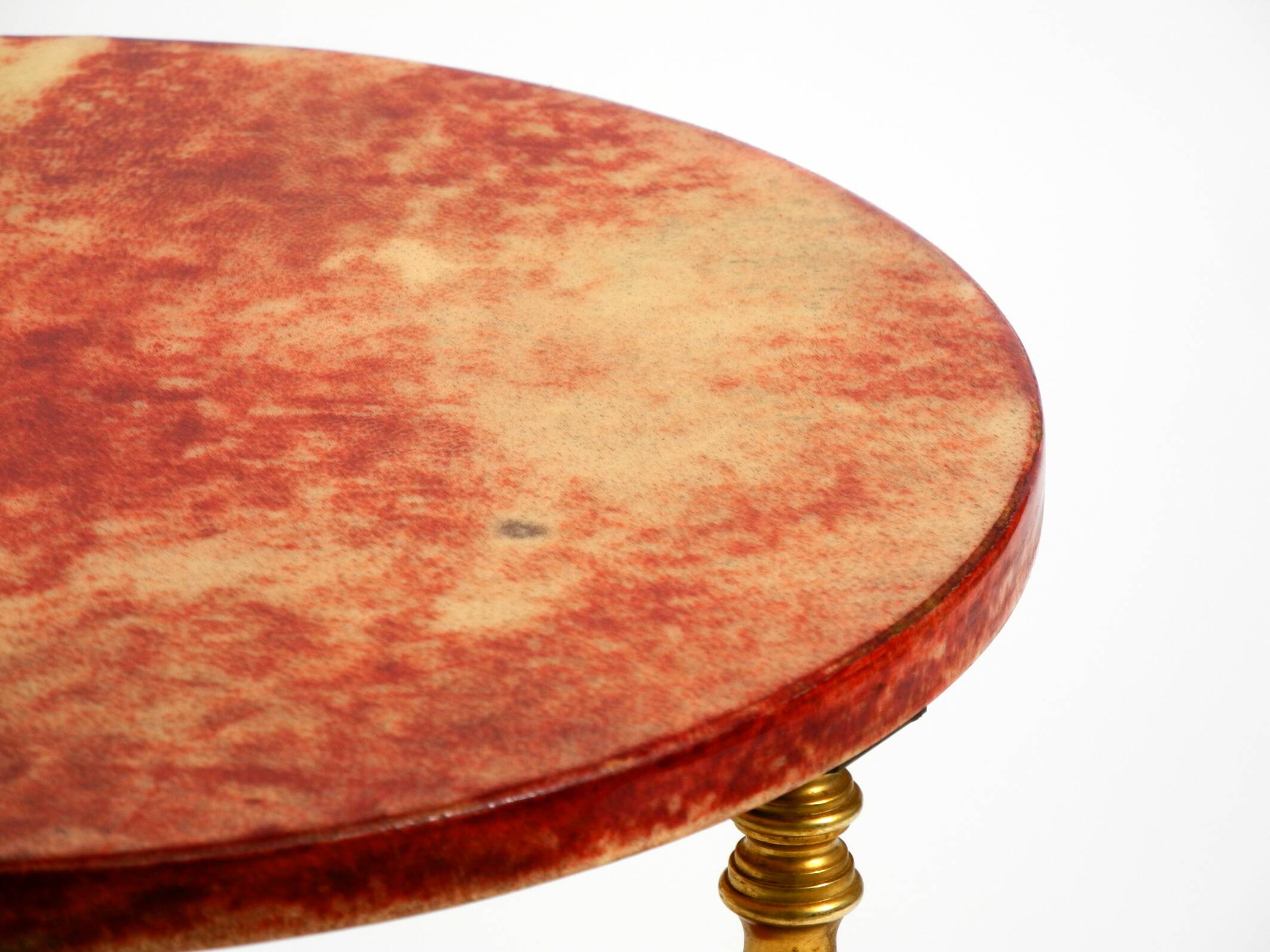 Round, small 1960s Aldo Tura serving or bar trolley in red goatskin leather