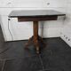 Old pedestal table with oak legs and marble top